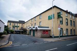 a building on the side of a street at Ivy Bush Royal Hotel by Compass Hospitality in Carmarthen