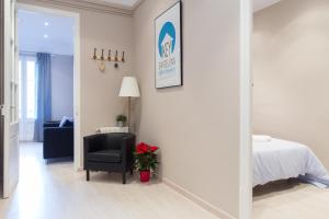 Postel nebo postele na pokoji v ubytování Key Barcelona HOUSING (Carrer Girona)