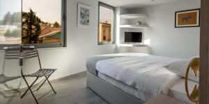 Posteľ alebo postele v izbe v ubytovaní Fos Residential Apartments