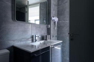 Kúpeľňa v ubytovaní Fos Residential Apartments