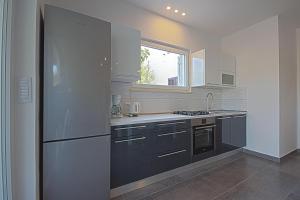 Kuchyň nebo kuchyňský kout v ubytování Apartman Topolino