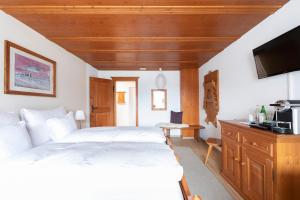 Postel nebo postele na pokoji v ubytování Eden Hotel und Restaurant