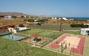 an aerial view of a tennis court with a basketball court at Magda Hotel Club in Gouves