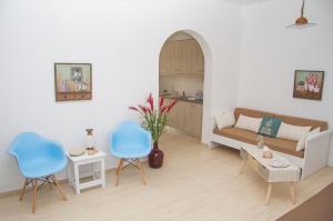 A seating area at white house by the sea