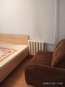 מיטה או מיטות בחדר ב-Apartments na Gvardeyskom