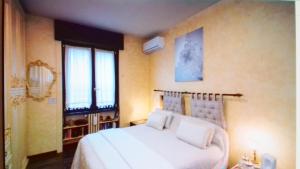 Postel nebo postele na pokoji v ubytování Bed & Breakfast A San Siro 75