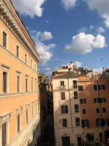 a view of two buildings from between two buildings at Pantheon Luxury Suite in Rome