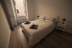 Кровать или кровати в номере Arcadia apartments