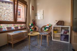 Posezení v ubytování Albergue de Prioro