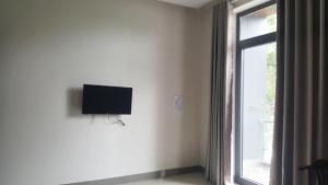 TV a/nebo společenská místnost v ubytování Motel Thanh Long