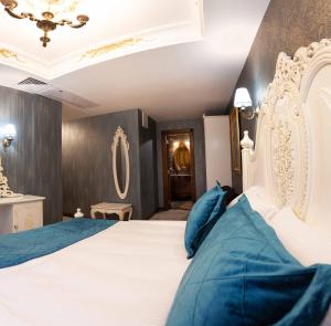 Postel nebo postele na pokoji v ubytování Bablin Butik Otel