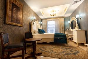 Postel nebo postele na pokoji v ubytování Bablin Butik Otel