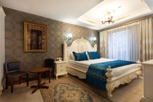 Postel nebo postele na pokoji v ubytování Bablin Butik Otel