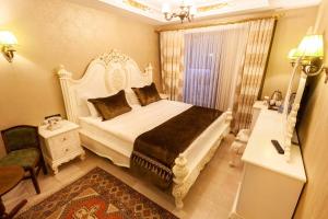 Postel nebo postele na pokoji v ubytování Bablin Butik Otel
