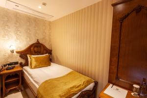 Postel nebo postele na pokoji v ubytování Bablin Butik Otel