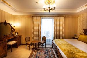 Postel nebo postele na pokoji v ubytování Bablin Butik Otel