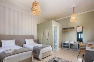 Кровать или кровати в номере Danai Villa by PaxosRetreats