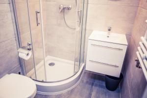 Ein Badezimmer in der Unterkunft Apartamenty 21 Basic