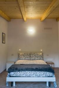 Posteľ alebo postele v izbe v ubytovaní Appartamento Il Fattore