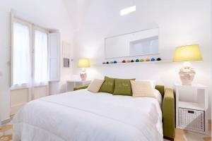 A bed or beds in a room at Li Frati Casa Vacanze