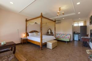Giường trong phòng chung tại Gengmengyuan B&B