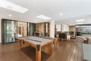 A pool table at Luxury Pool Side Apartment in Beachfront Resort