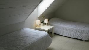 Ένα ή περισσότερα κρεβάτια σε δωμάτιο στο Villa Blanche +69 φωτογραφίες