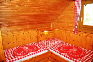 Ein Bett oder Betten in einem Zimmer der Unterkunft Almhaus Weißmann