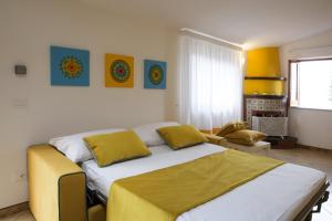 A bed or beds in a room at Relais Villa Chiara free parking