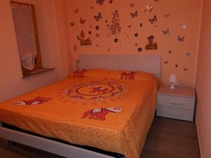 Postel nebo postele na pokoji v ubytování b&b L'Aquila del Parco