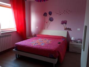 Postel nebo postele na pokoji v ubytování b&b L'Aquila del Parco + 8 fotografií