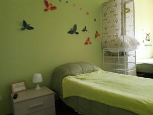 Postel nebo postele na pokoji v ubytování b&b L'Aquila del Parco