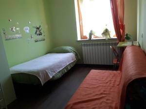 Postel nebo postele na pokoji v ubytování b&b L'Aquila del Parco