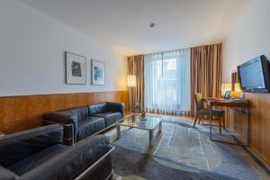 Televízia a/alebo spoločenská miestnosť v ubytovaní K+K Hotel Opera