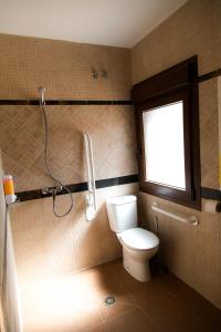 Ванная комната в Apartamentos "Casa Rural de Aldea"