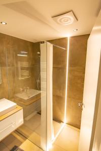 a bathroom with a shower and a sink at vista monte in Eben im Pongau