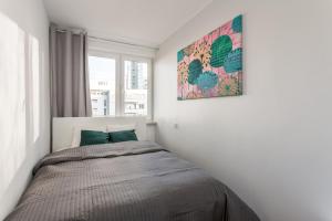 Posteľ alebo postele v izbe v ubytovaní Chill Apartments Pańska