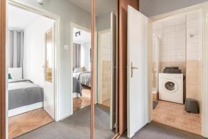 Posteľ alebo postele v izbe v ubytovaní Chill Apartments Pańska