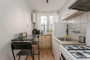 Kuchyňa alebo kuchynka v ubytovaní Chill Apartments Pańska