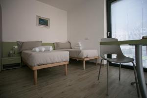 Postel nebo postele na pokoji v ubytování B & B Il sorriso