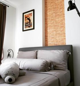 Postel nebo postele na pokoji v ubytování Baan Kiang Fah by Makuro