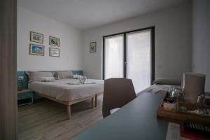 Postel nebo postele na pokoji v ubytování B & B Il sorriso