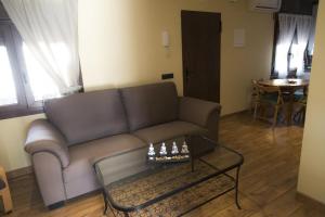 Гостиная зона в Apartamentos "Casa Rural de Aldea"
