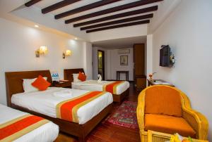 Postel nebo postele na pokoji v ubytování Apsara Boutique Hotel + 37 fotografií