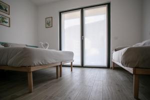 Postel nebo postele na pokoji v ubytování B & B Il sorriso