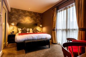 Postel nebo postele na pokoji v ubytování The Alma Hotel + 14 fotografií
