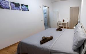 Postel nebo postele na pokoji v ubytování CASAMINA
