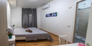 Postel nebo postele na pokoji v ubytování CASAMINA