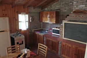 Una cocina o kitchenette en La Casita de Melipal