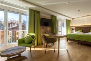 En eller flere senger på et rom på Hotel Bristol
